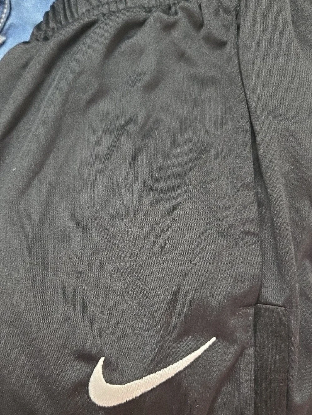 Nike Black Track Pants with White Swoosh Logo